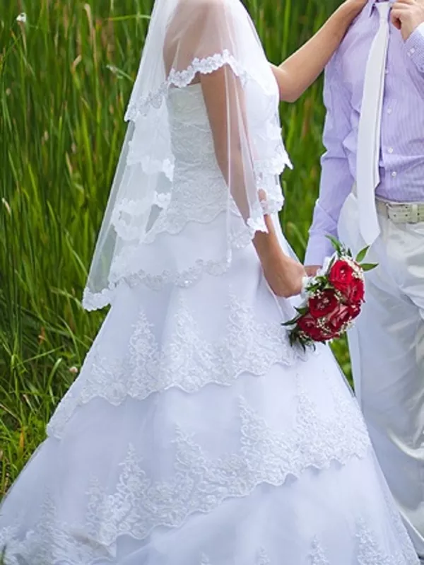 Продам Великолепное свадебное платье с шитьем! 200$ 2