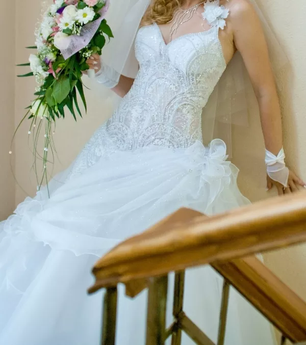 Очень красивое пышное свадебное платье! 4